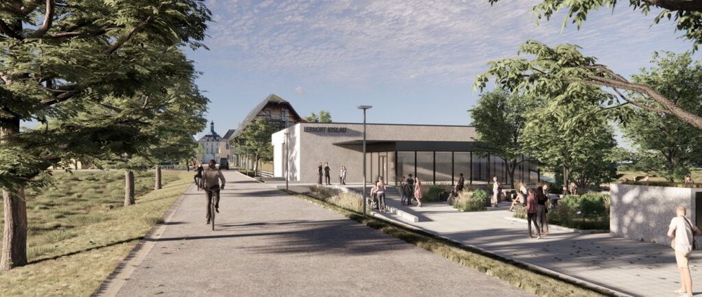 Ein modernes Gebäude mit großen Fenstern steht neben einem von Bäumen gesäumten Weg. Die Menschen gehen spazieren, fahren Rad und sitzen draußen auf Bänken. Der Himmel ist teilweise bewölkt und die Umgebung ist grün.